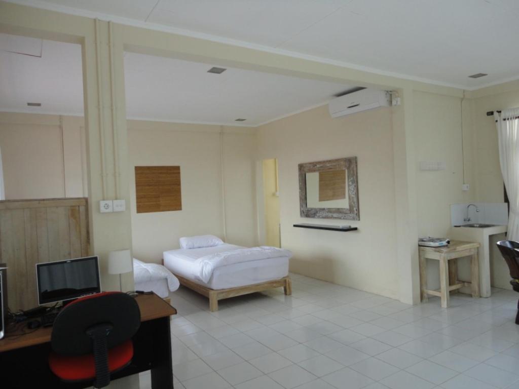 Urbanview Hotel Wayan Mansion Denpasar  Room photo